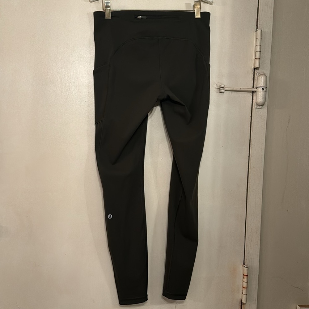 Brand new LULULEMON khaki green full length leggings with deep side pockets Sz.8